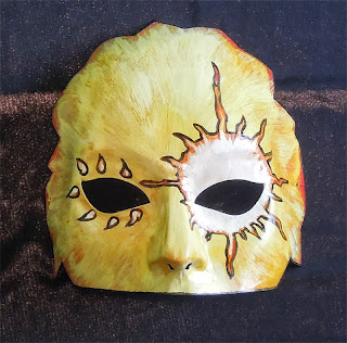 Hand painted mask of Brother Sun for St. Francis
