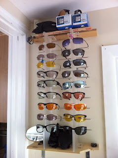 Tifosi Optics rack at llama's house