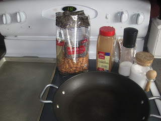 Ingredients for cinnamon almonds lined up on stove