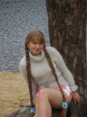 Blond Rapunzel girl with two long braids