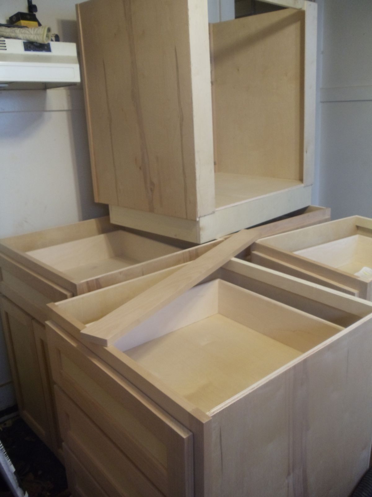 Unfinished discount kitchen cabinets We started by doing demo of the old base cabinets and putting in some