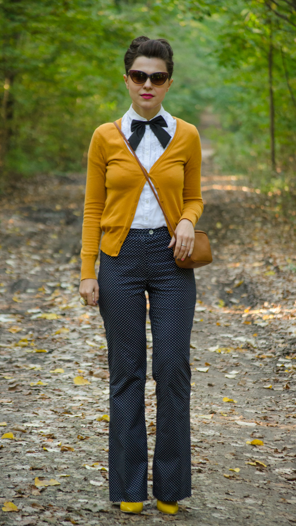 navy flares pants white shirt mustard sweater black bow-tie brown satchel bag koton C&A dotted cat-eye glasses mustard heels