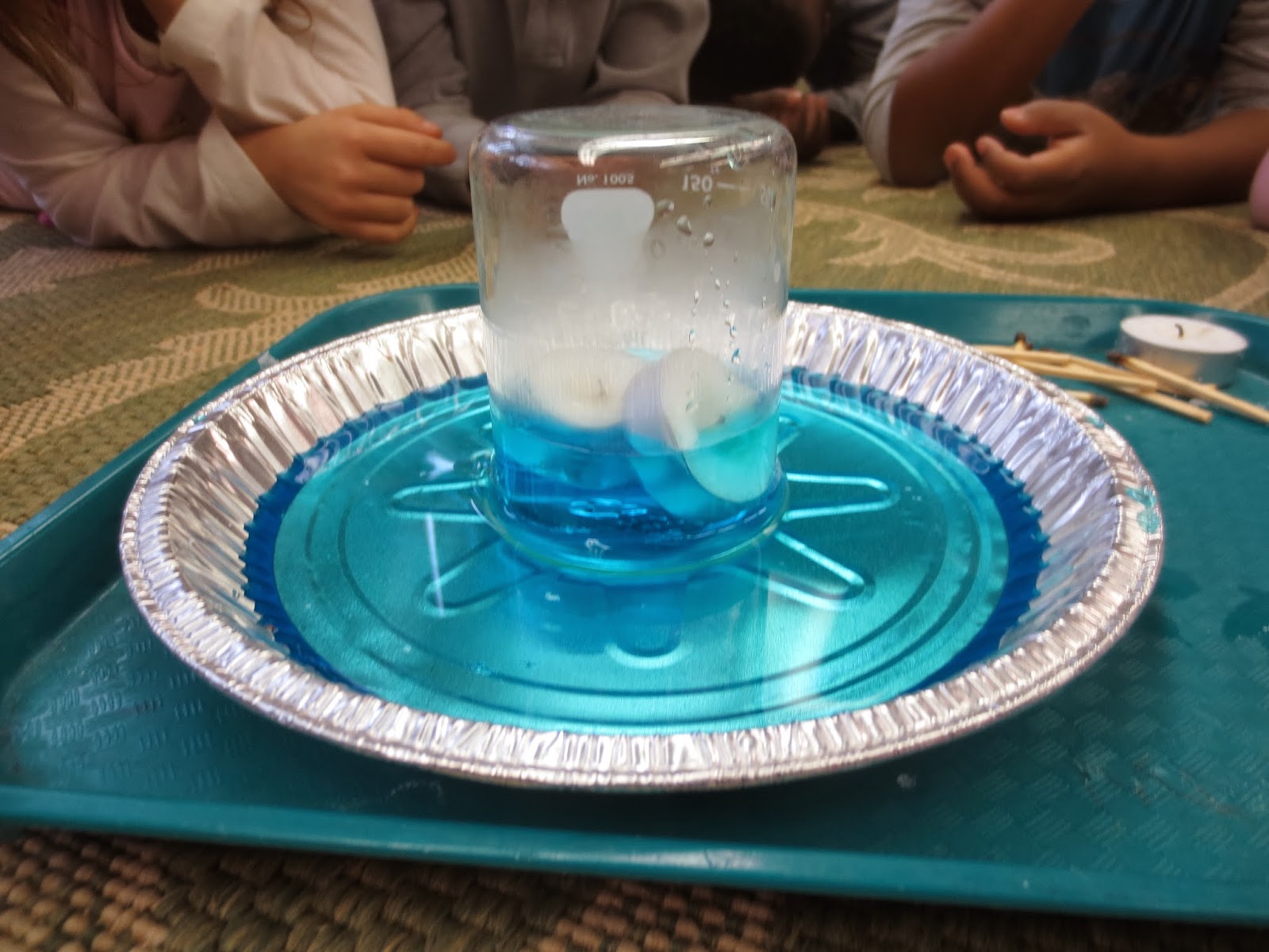AFS Lower School Science Candle and Beaker Experiment Air Pressure