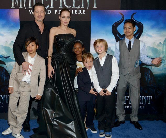 Angelina Jolie and Brad Pitt are still engaged as they on a red carpet in Los Angeles Angelina Jolie was trying to apply her perfect fashion statement when she wore a beautiful black dress alongside her boyfriend Brad Pitt on Wednesday, May 28, 2014 at Los Angeles, USA.
