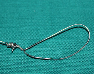 a wire loop on a green background