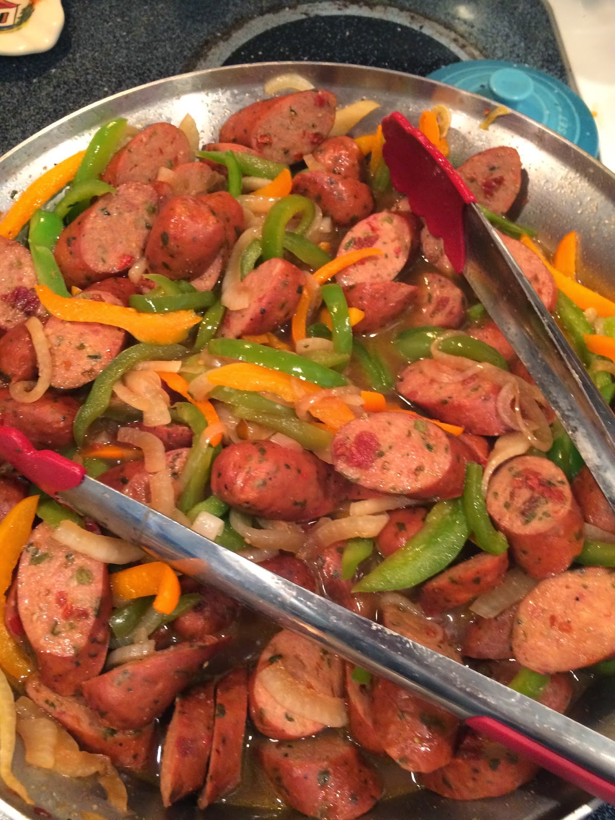 My Salty Kitchen Sausage, Peppers, and Onions Over Rice