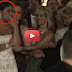 The groom kisses this woman in front of the bride. As she sees, she is weeping.
