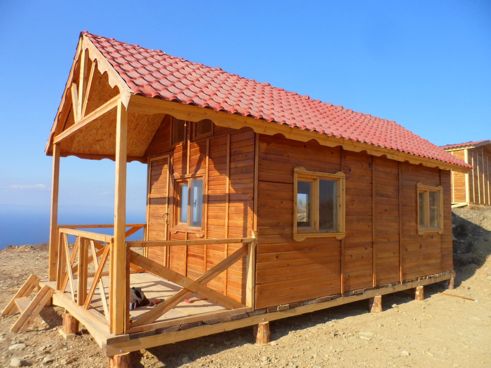 Ahşap ev PREFABRİK AHŞAP POLİMİT ÇATILI 21 m2 batar katlı ev