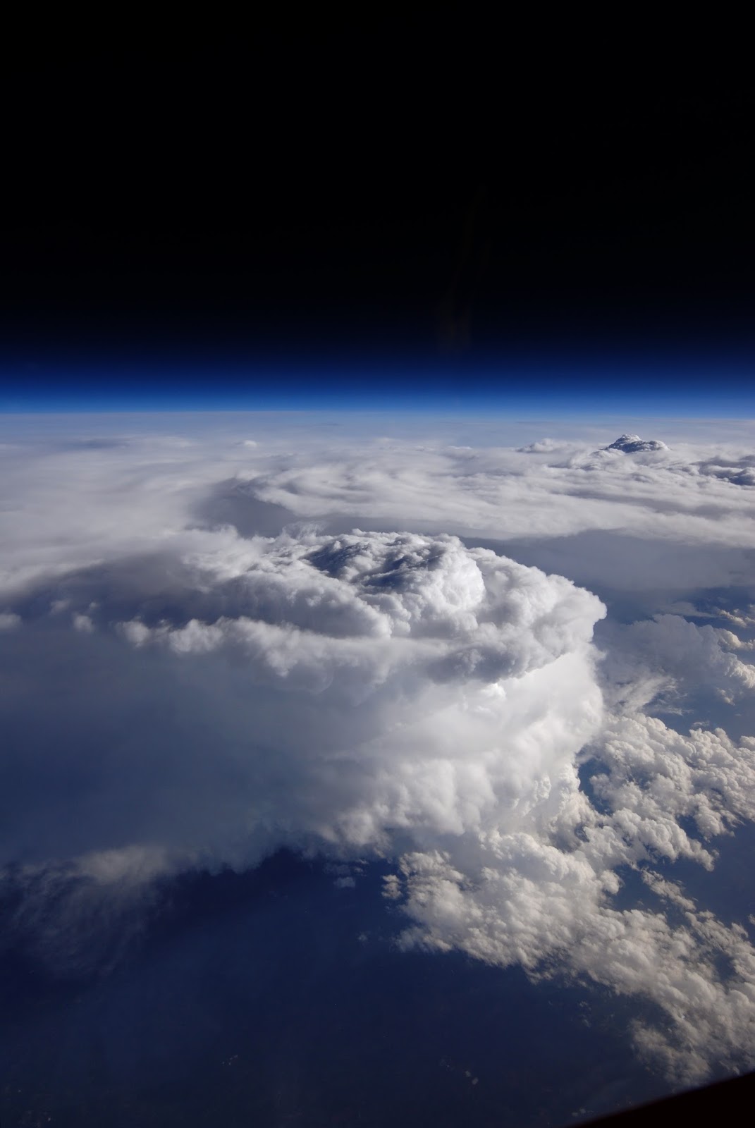 Storm Cell over the Southern Appalachian Mountains Storm Cell over the Southern Appalachian Mountains   This storm cell photo was taken from NASA's high-altitude ER-2 aircraft on May 23, 2014, during a study aimed at gaining a better understanding of precipitation over mountainous terrain. The Integrated Precipitation and Hydrology Experiment, or IPHEx, field campaign is part of the ground validation effort for the Global Precipitation Measurement (GPM) mission, an international satellite mission led by NASA and the Japan Aerospace Exploration Agency. GPM's Core Observatory launched Feb. 27, 2014, to provide next-generation observations of rain and snow worldwide every three hours. But to get accurate measurements from space, scientists have to understand what is happening on the ground.  For the six-week IPHEx field campaign over the southern Appalachian mountains, the NASA team and their partners at Duke University and NOAA's Hydrometeorological Test Bed set up ground stations with rain gauges and ground radar throughout western North Carolina. In addition to the ground sites, they also collected data sets from satellites and two aircraft.  The NASA ER-2 aircraft that deployed to Robins Air Force Base in Warner Robins, Georgia, was able to fly when rain was in the air. The ER-2's cruising altitude of 65,000 feet kept it well above the storm systems it was observing, allowing it to act as a proxy-satellite. The aircraft carried a suite of instruments, including three that took measurements similar to those taken by GPM's Core Observatory.  Image Credit: NASA / Stu Broce Explanation from: http://www.nasa.gov/content/storm-cell-over-the-southern-appalachian-mountains/