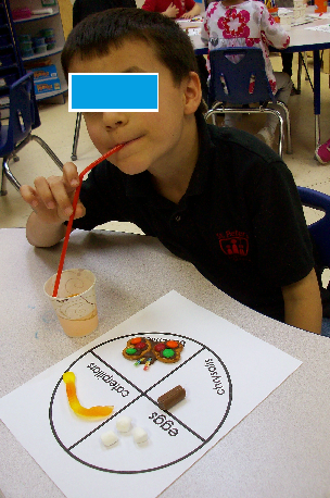 OH! Almost forgot! Check out this kinder-guy using his straw as a
