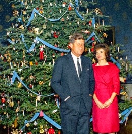 President and Mrs. Kennedy in front of their Christmas tree in 1963