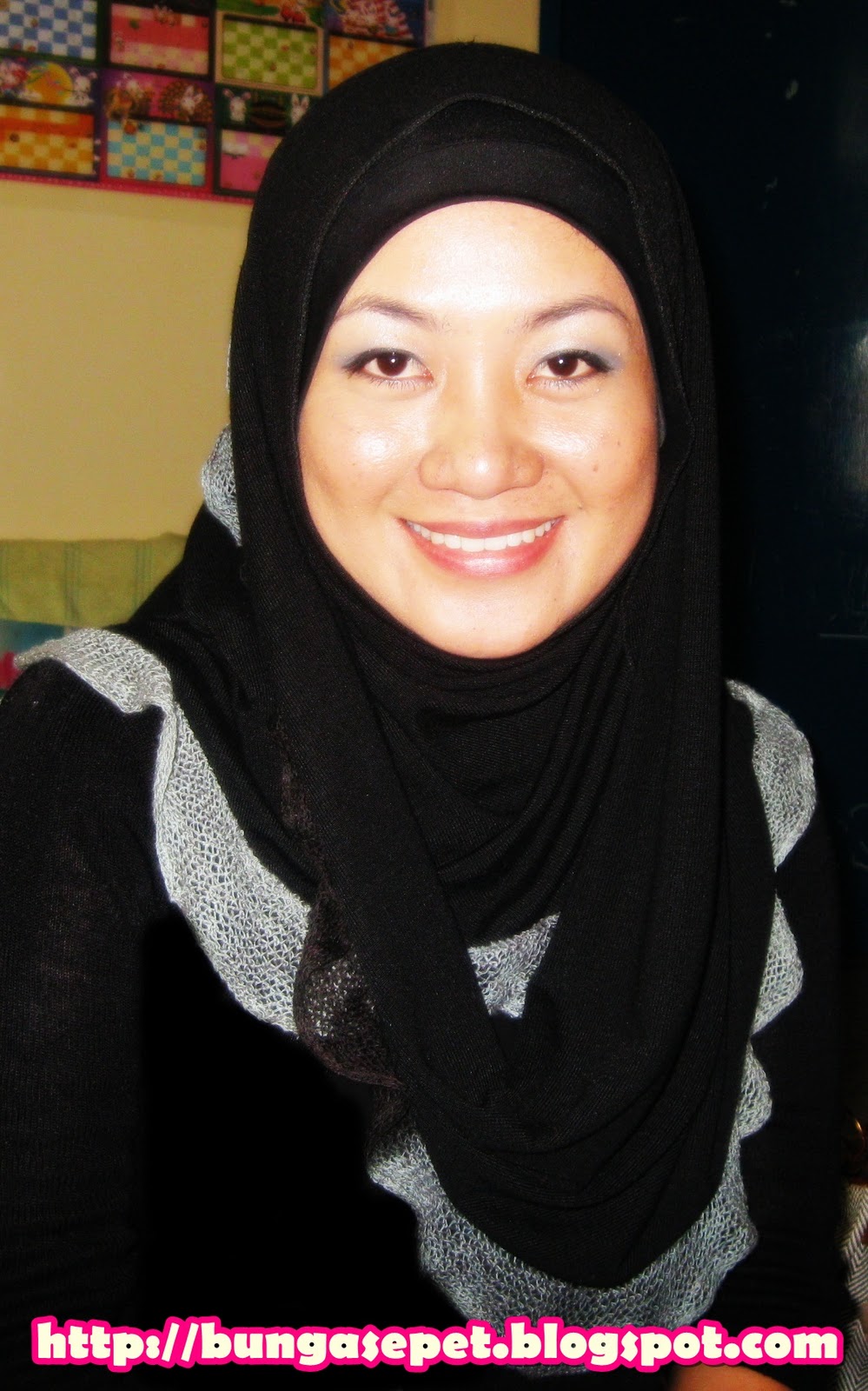 tudung tiga segi