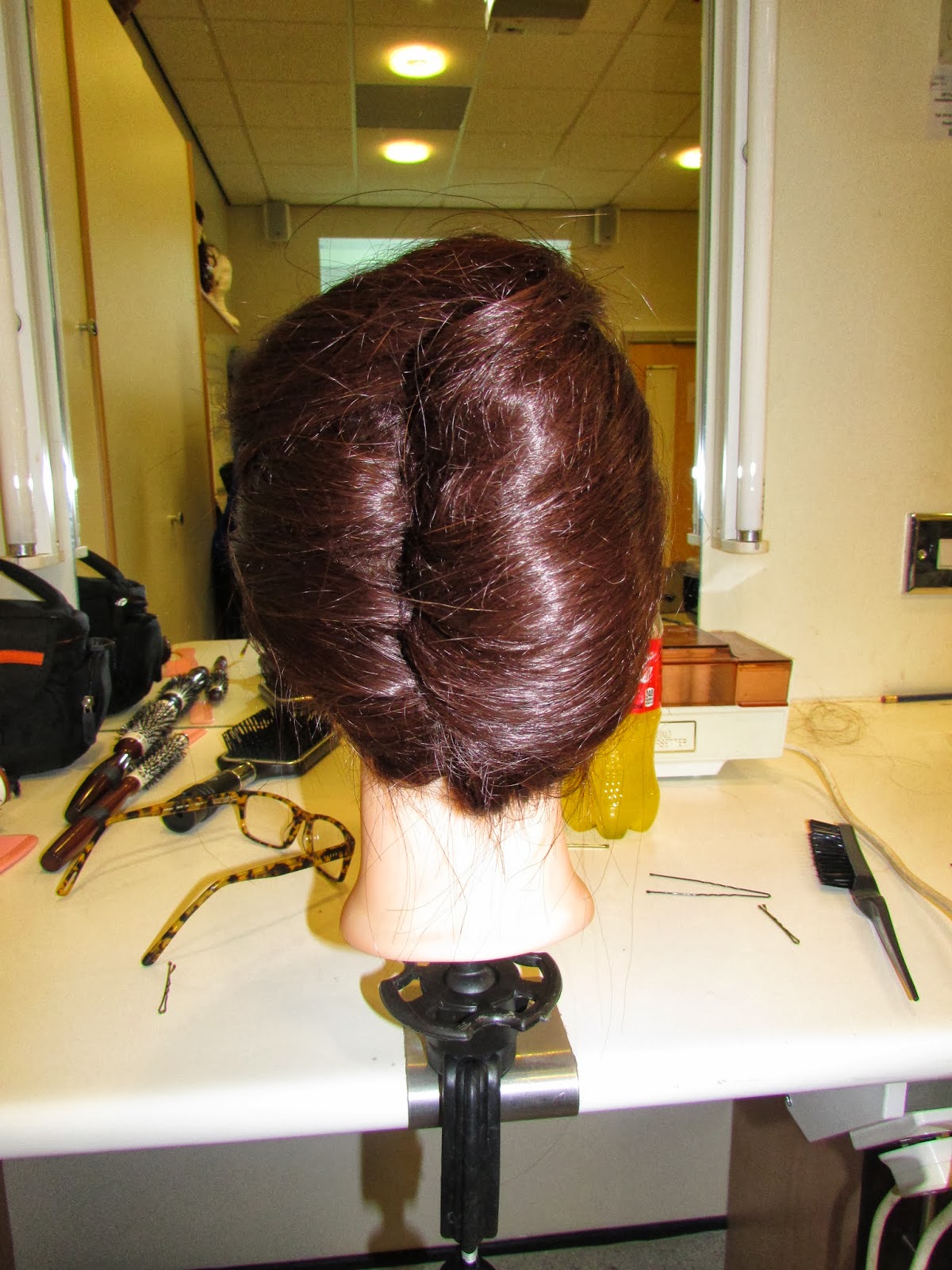 Natasha Oxtoby Hairdressing, first vertical roll.