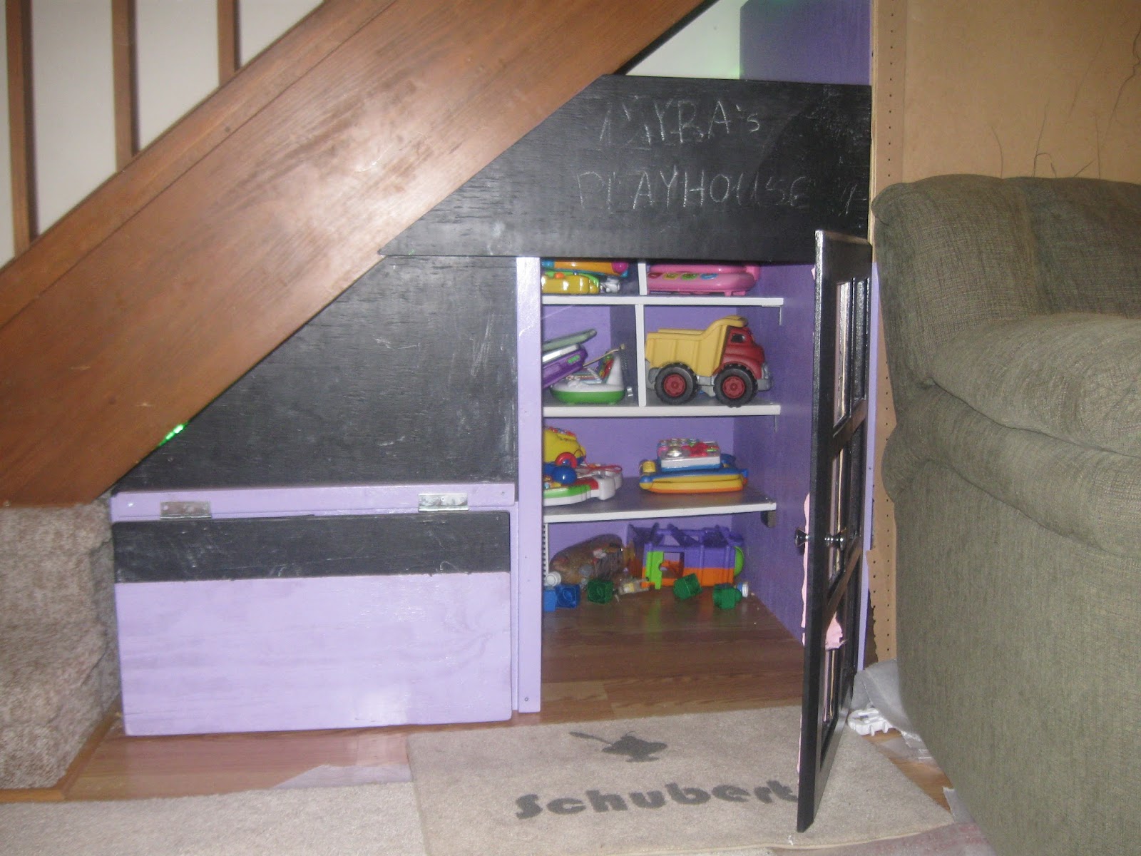 toy storage under stairs