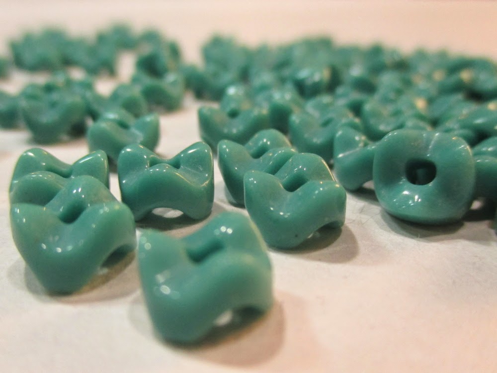 Turquoise glass vertebrae beads.