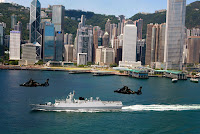 Frigates and helicopters joined the PLA's Central garrison to take part in yesterday's air-sea drill in Victoria Harbour PLA drill