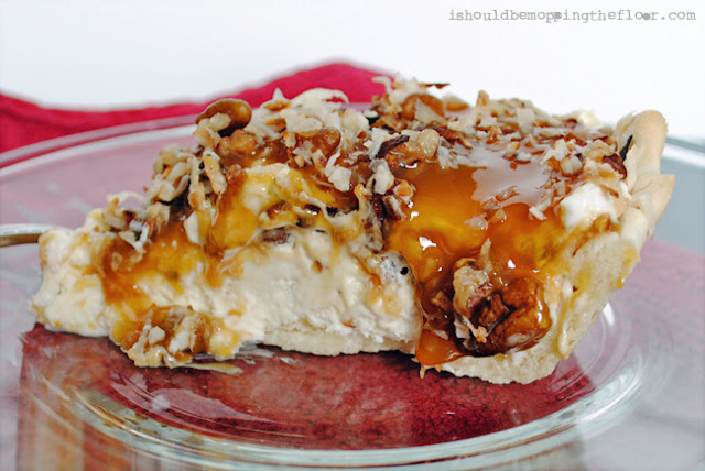 The only part of this pie that has to be baked is the crust! The rest is just layers of fabulous, including cream cheese, caramel, pecans, coconut and more! It's a show stopper that tastes amazing! Recipe makes two pies: freeze one for later!