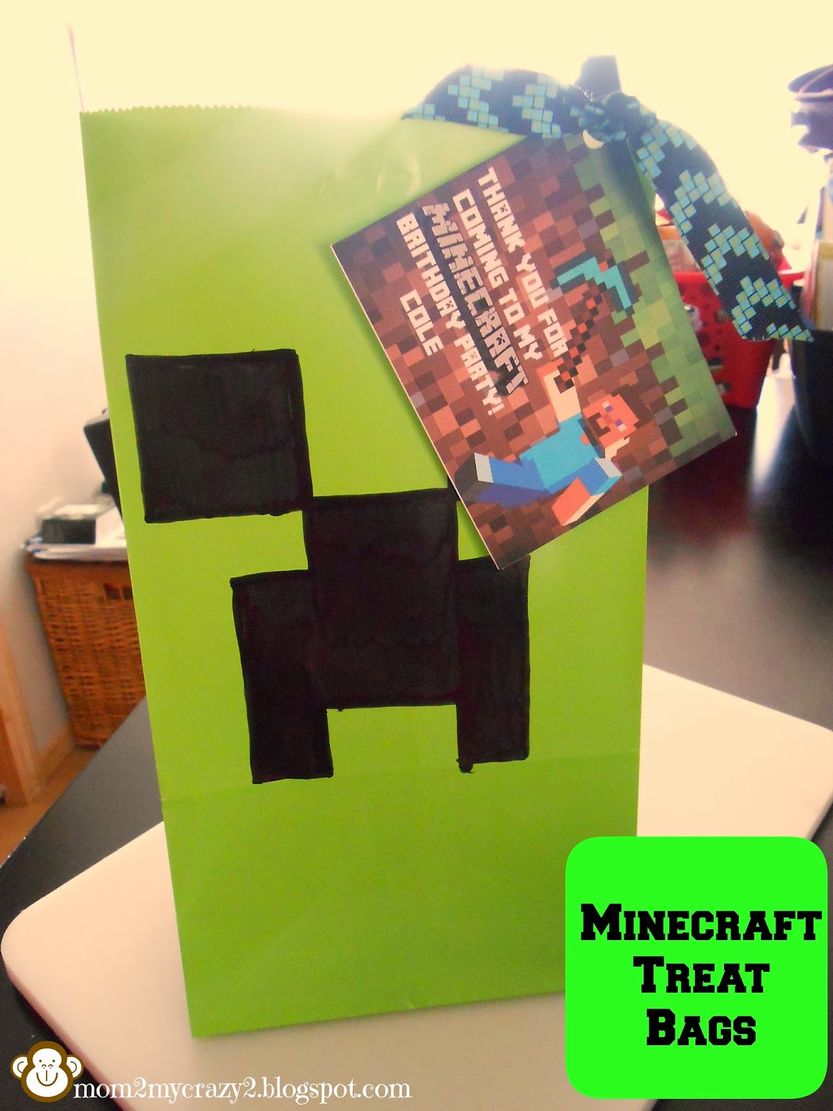 DIY Minecraft party bags using cheap black paper sacks and printed
