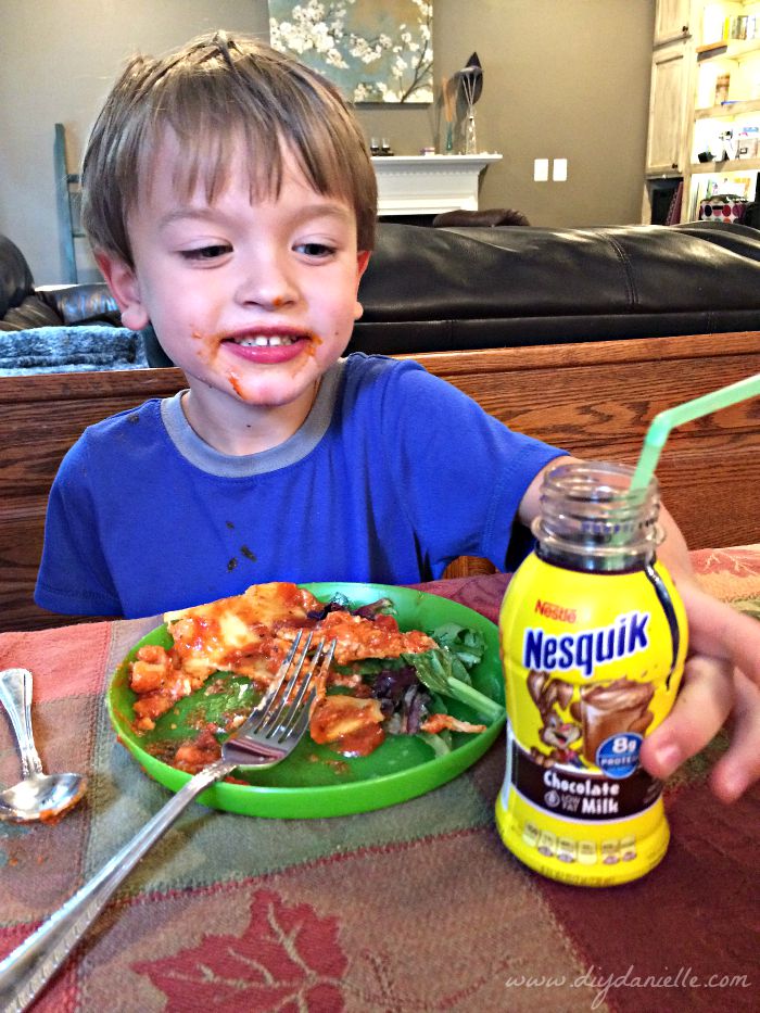 Enjoying a quick and easy dinner prepared by NESTLÉ®. Tip for Keeping Halloween Simple and Easy: Pick up STOUFFER'S® Family Size Entrées and NESQUIK® Ready to Drink Chocolate milk for a quick dinner. #ad #Treats4All #CollectiveBias