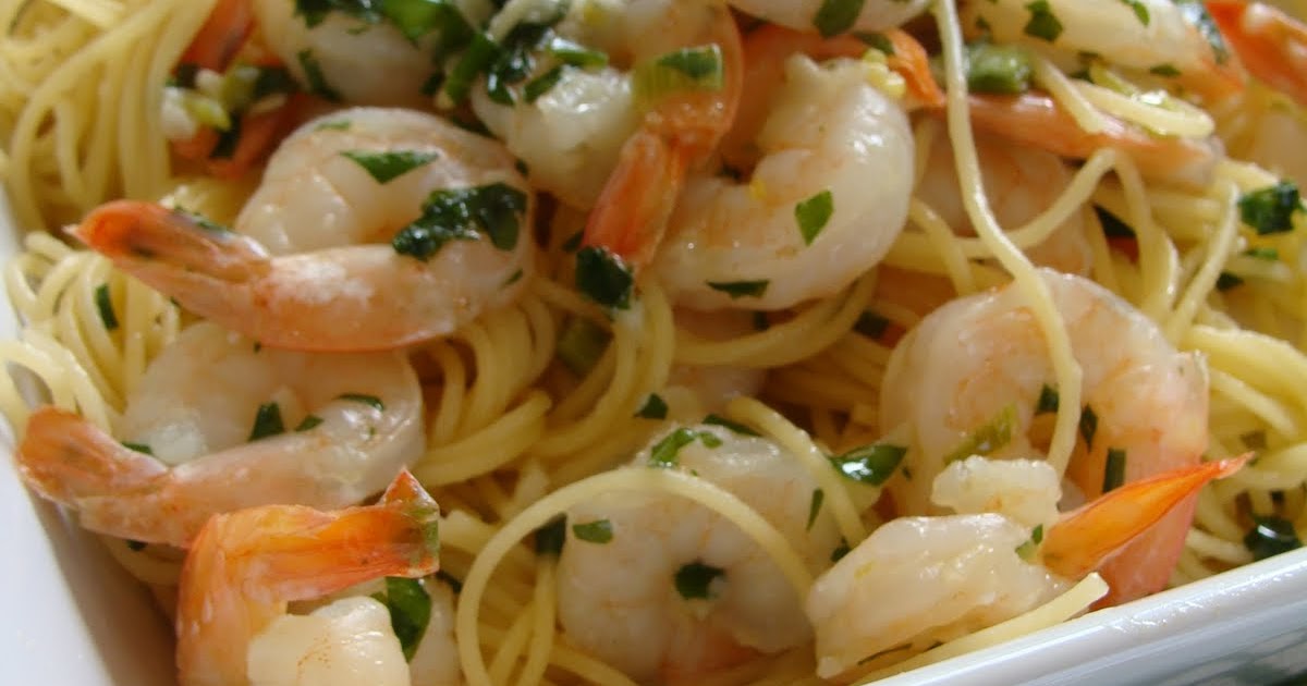 cooking shrimp scampi over