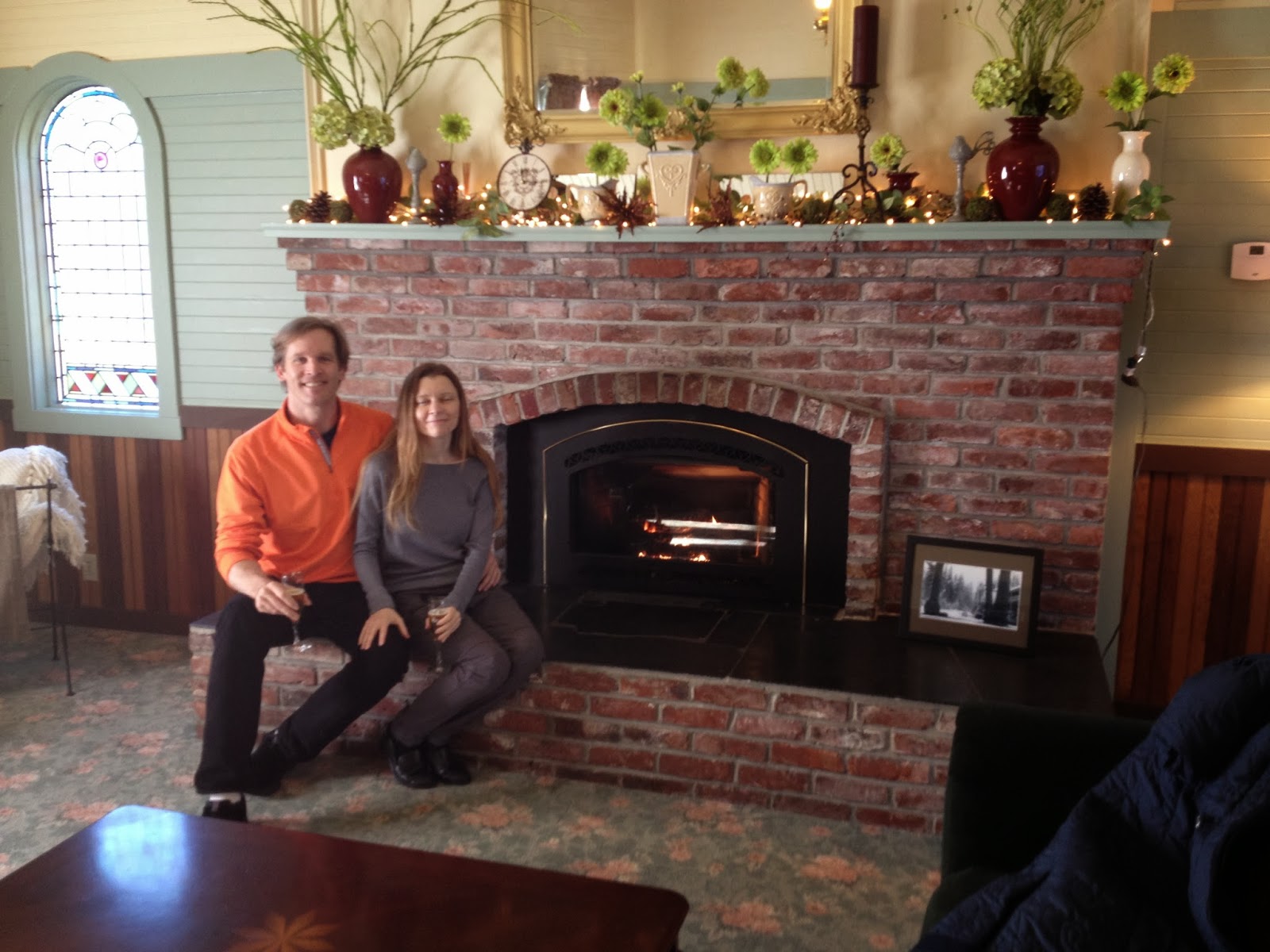 Criag and Allison in front of the fireplace at Alexander's Country Inn - Patricia Stimac, A Heavenly Ceremony Allison and Craig warm up at Alexander's Country Inn - Patricia Stimac, Seattle Wedding Officiant