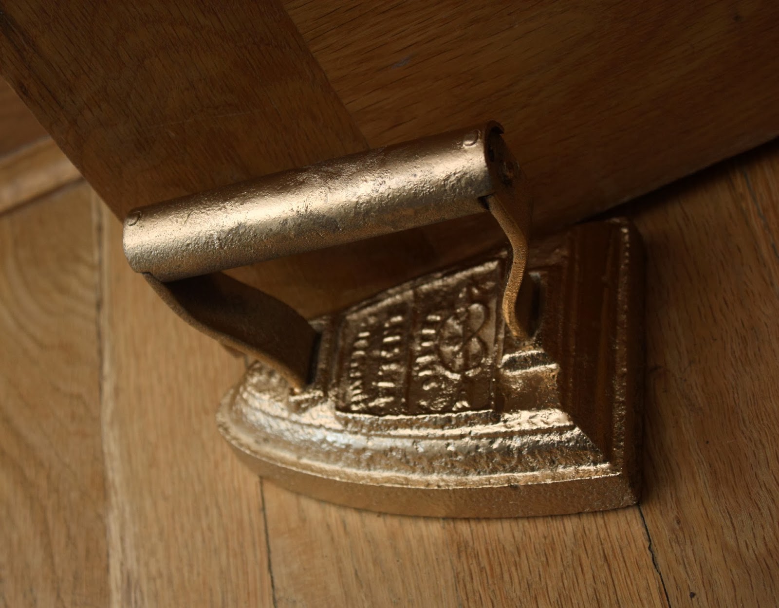 megmade Cast Iron doorstop makeover!