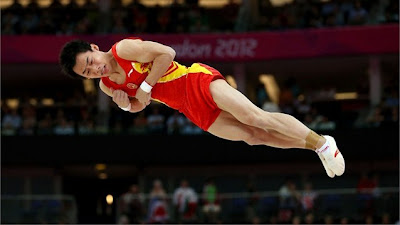 Zou Kai of China competes on the floor in the Artistic Gymnastics