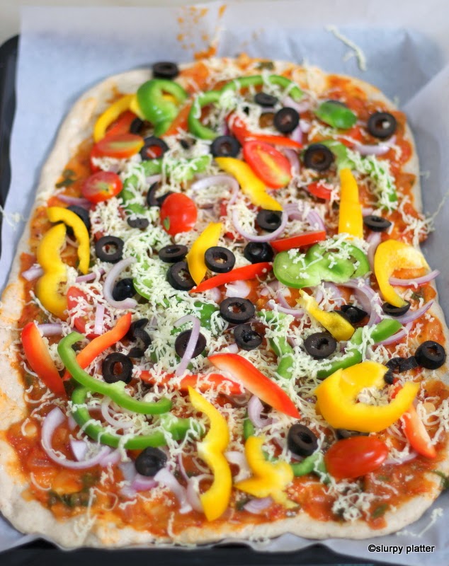 Multi grain pizza just before going inside the oven Multi grain pizza