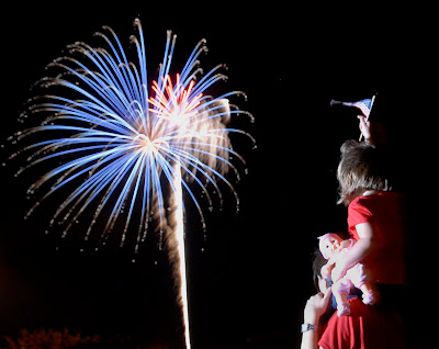 Child Watching July 4th Fireworks
