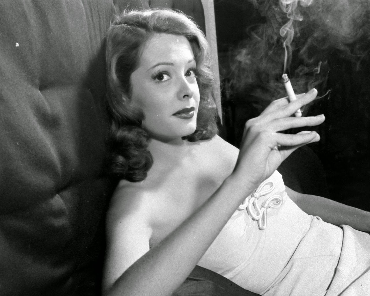 Smoking in Bed: Jane Greer.