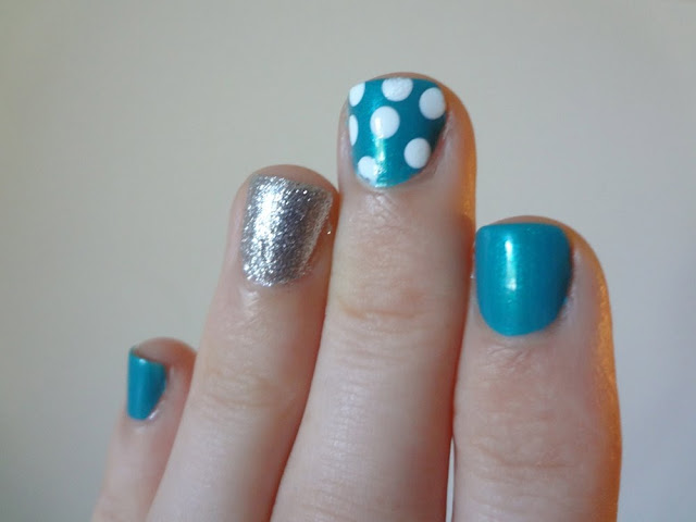 Turquoise nail polish, silver glitter, polka dots, accent nails