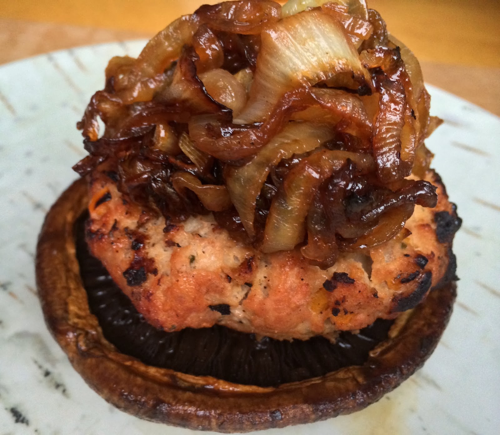 Clean Eating Turkey Burger with Caramelized Onions on a Portobello 