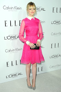 Emma Stone wearing a pink dress