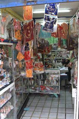 Small Shops Selling Crackers, Baby Jesus Outfits, Eggs, Party Supplies – Quito