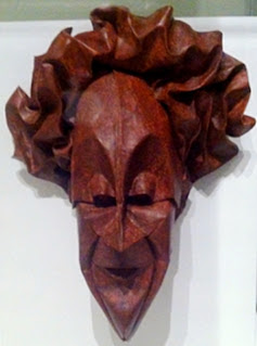 Crocker Art Museum-The Takeover-Exhibit-Origami Harlequin Mask Harlequin Mask that looks to be hard wood but is Origami.