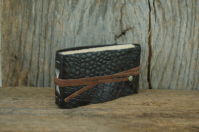 https://www.etsy.com/listing/248347465/walnut-writer-hand-bound-embossed?ref=shop_home_feat_2