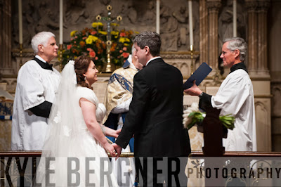 Bride and Groom saying vows during catholic ceremony in Baltimore