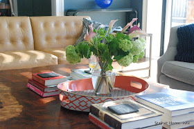 a kid-friendly way to style a living room- stacks of books 