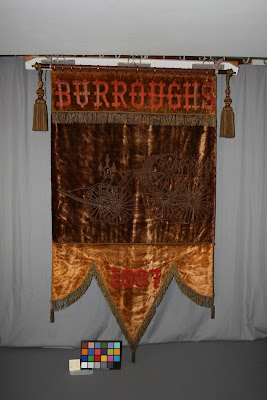 The banner, while slightly faded is still quite striking. The owning institution is quite pleased with the outcome. Restoration and repair of historic antique textiles, art conservation, 1887 banner and flag
