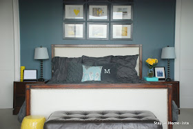 Charcoal grey bedroom with pops of yellow