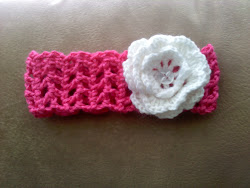 Large dark pink headband with white flower