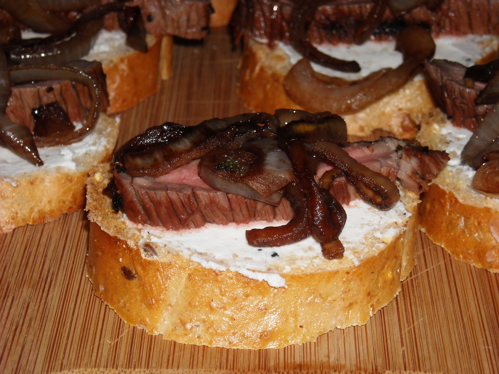 Leave a Happy Plate Grilled Steak Crostini with Caramelized Onions