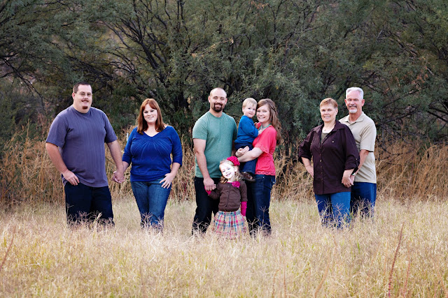 Tucson Natural Light Photographer Extended family pose for Tucson natural light photographer with a beautiful textured background