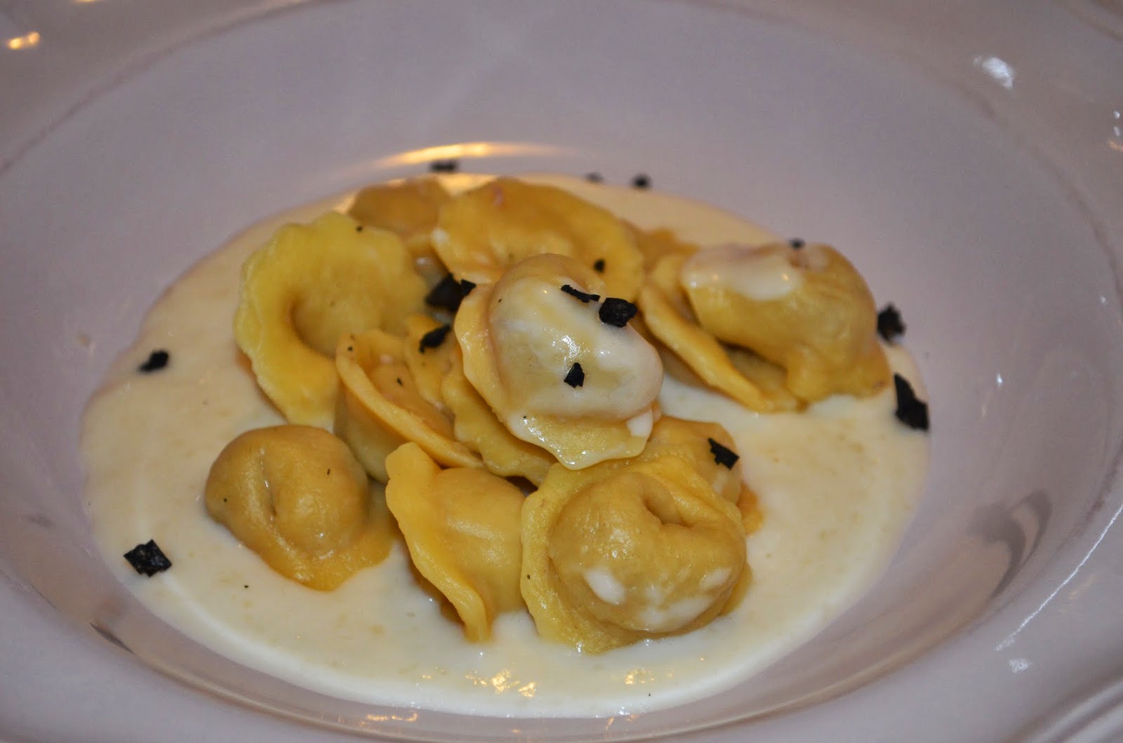 cappelletti hand made su fonduta di parmigiano