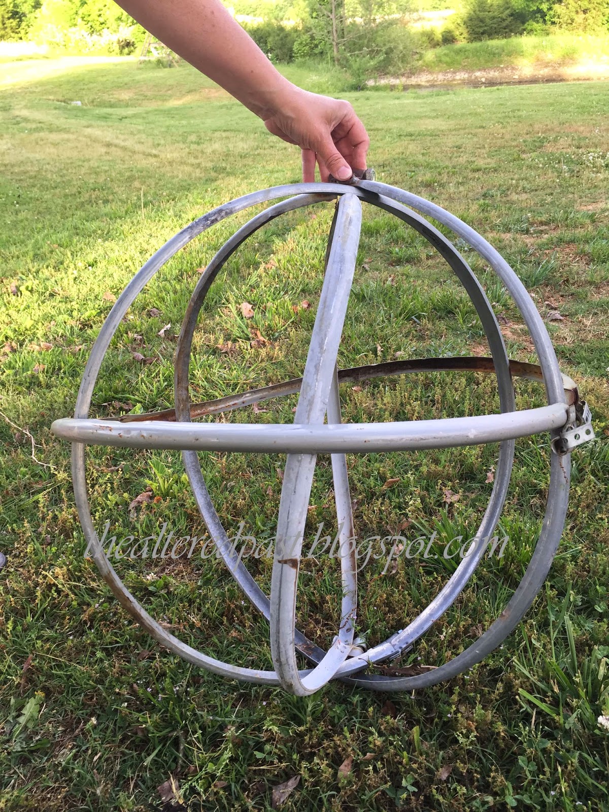 Spain Hill Farm Repurpose Steel Drum Rings into Garden Orbs
