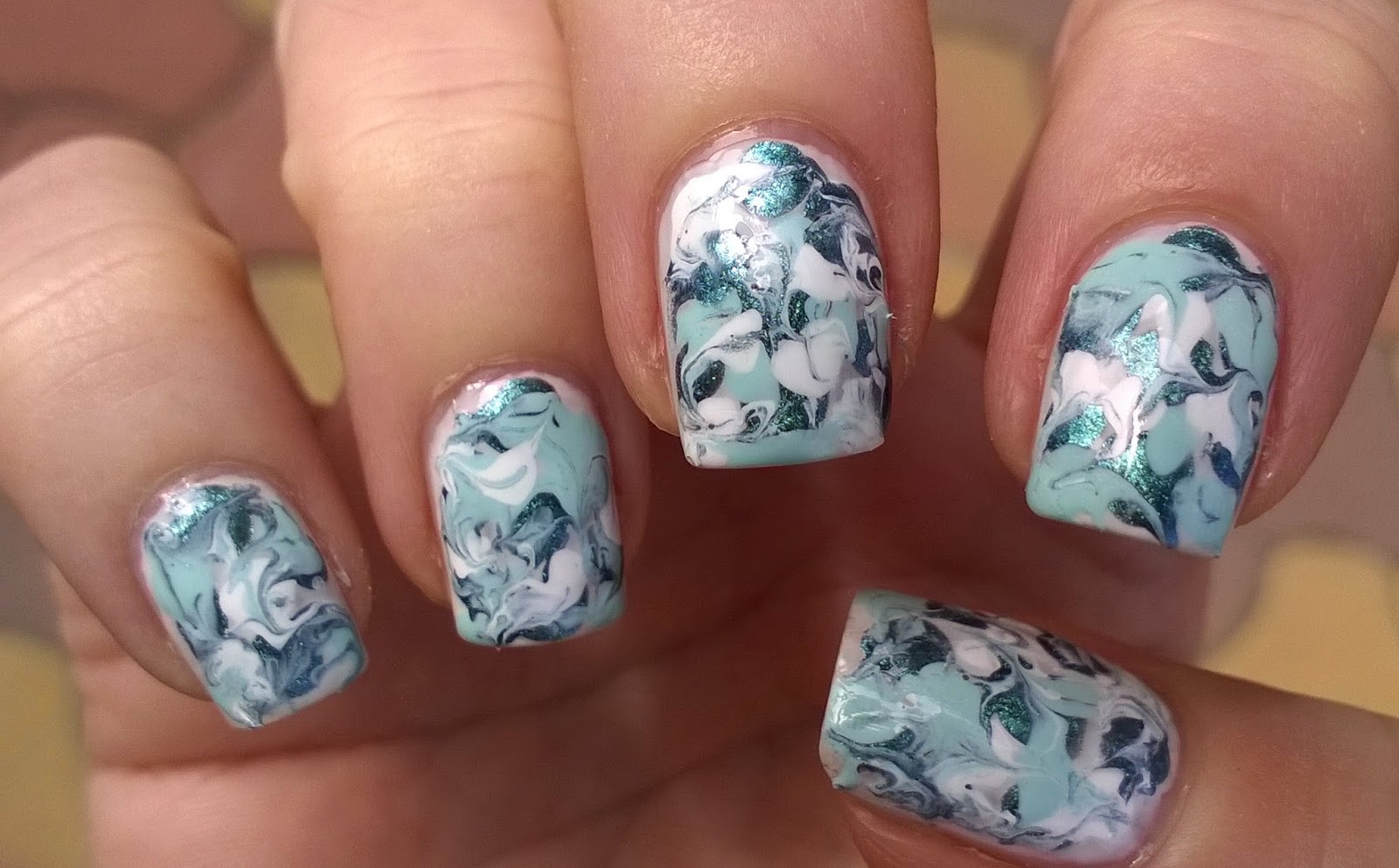 Beach marble nail design