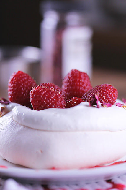 Rosewater Pavlovas with Raspberry Sauce | sweetpeasandsaffron.com