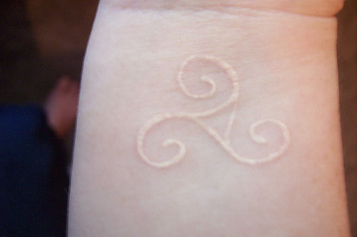 Simple design of white ink tattoo look more natural and beautiful, it ...
