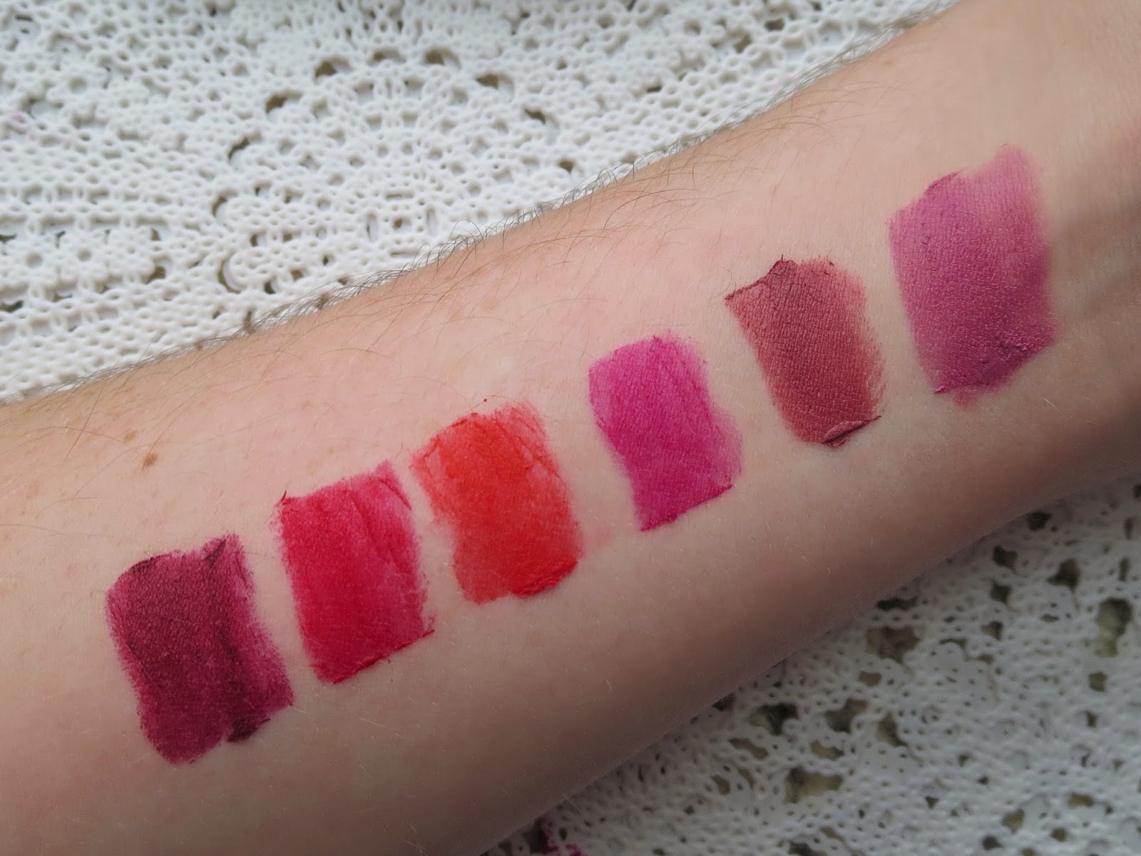 a picture of Maybelline Creamy Matte Lipsticks ; Divine Wine, Siren in Scarlet, Craving Coral, Mesmerizing Magenta, Touch of Spice, Lust for Blush (swatch)