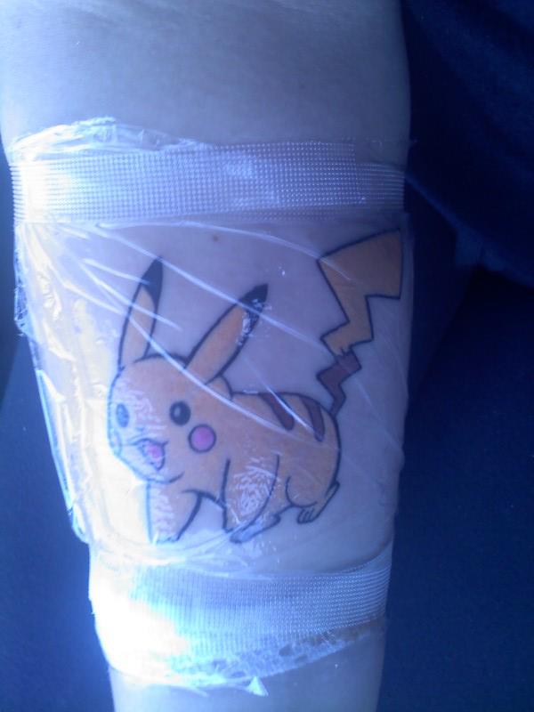 My pikachu tattoo on my forearm bc playing pokemon with my brother and